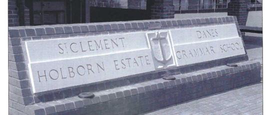 Black and white image of St Clement Danes School inscribed stone