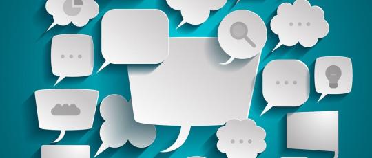 Various images of white speech bubbles on a blue background